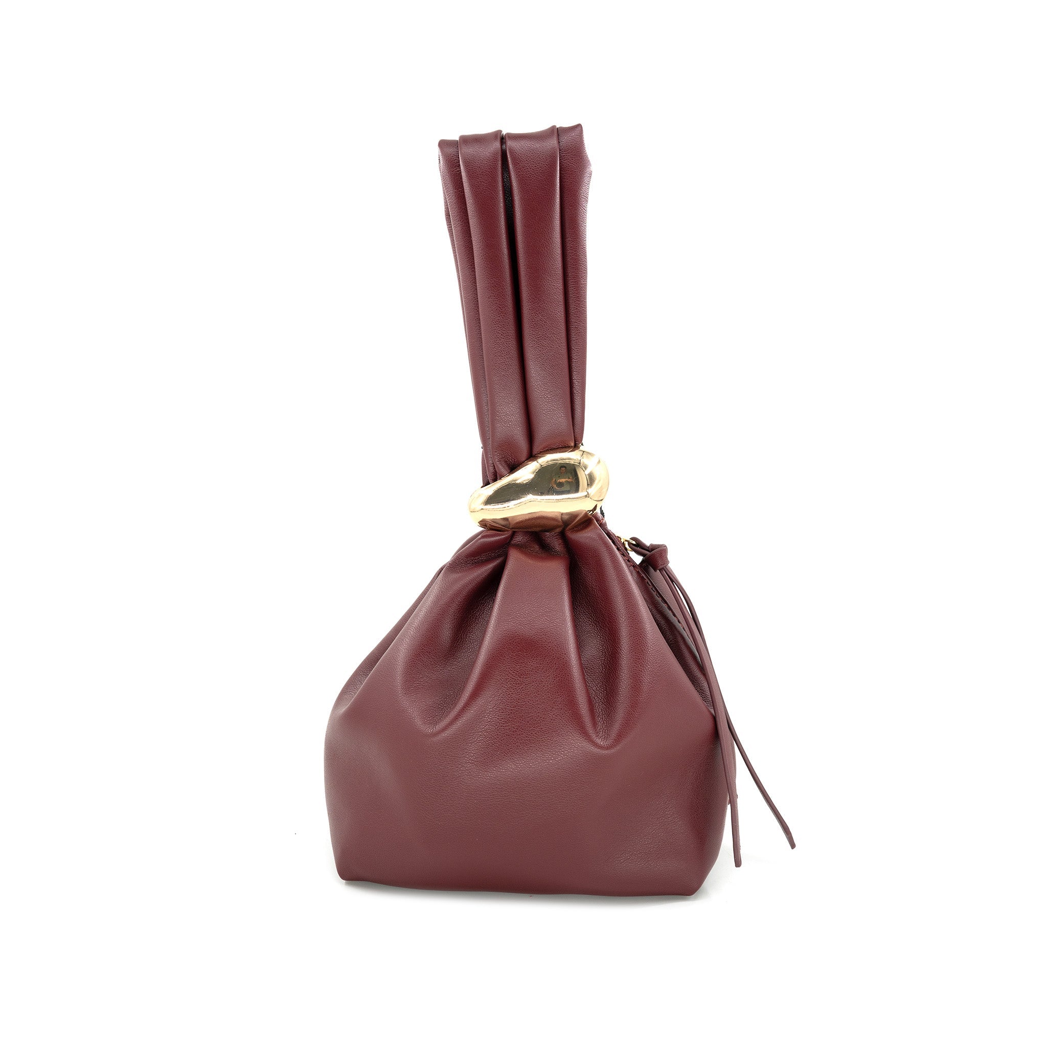 Evening bag in Burgundy featuring a crinkled paper bag-inspired silhouette with a structured shape and gold-tone clasp.