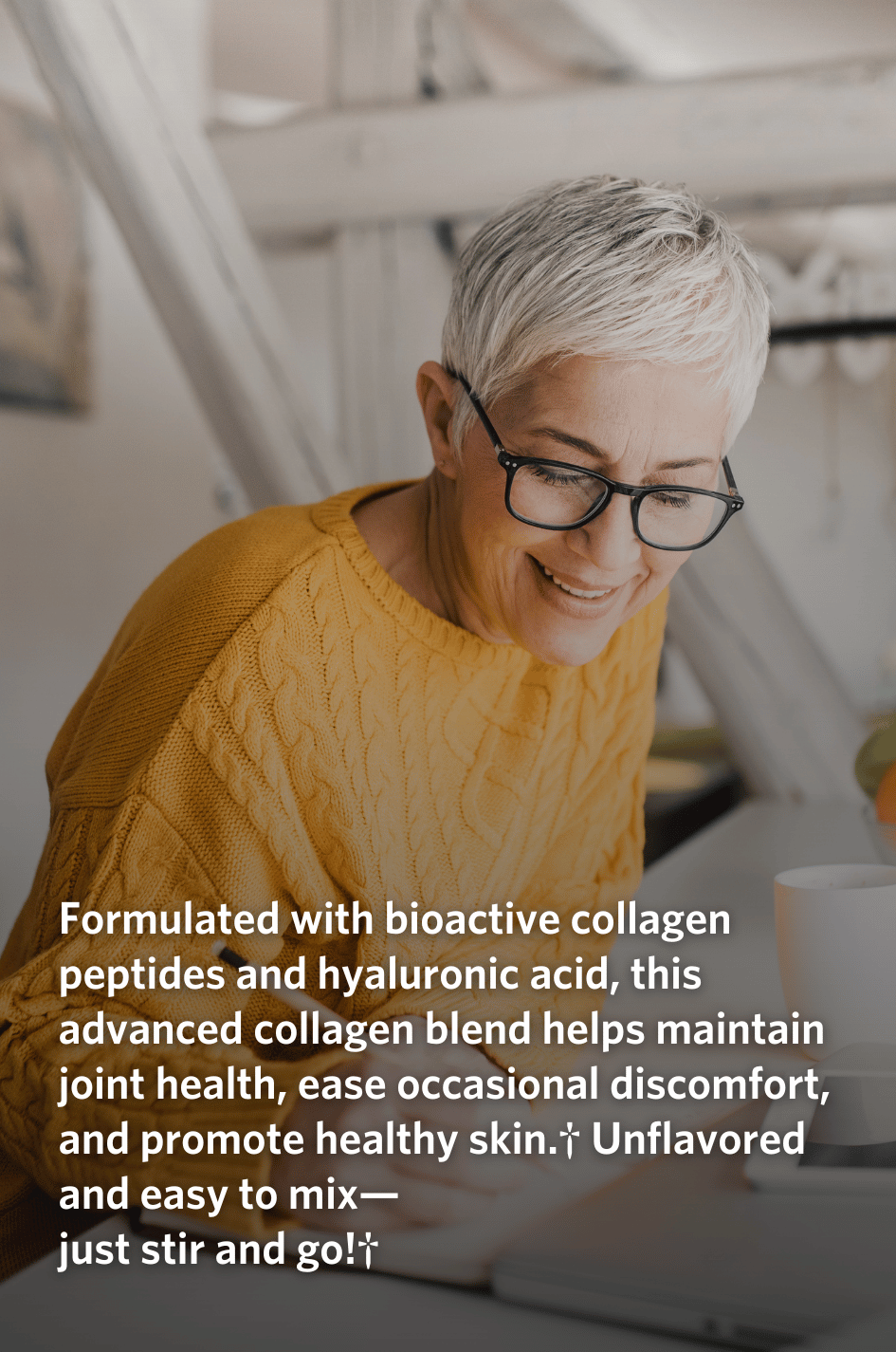 Woman using a laptop with text overlaid about the health benefits of Cooper Complete Collagen Complex Daily Stick Packets.