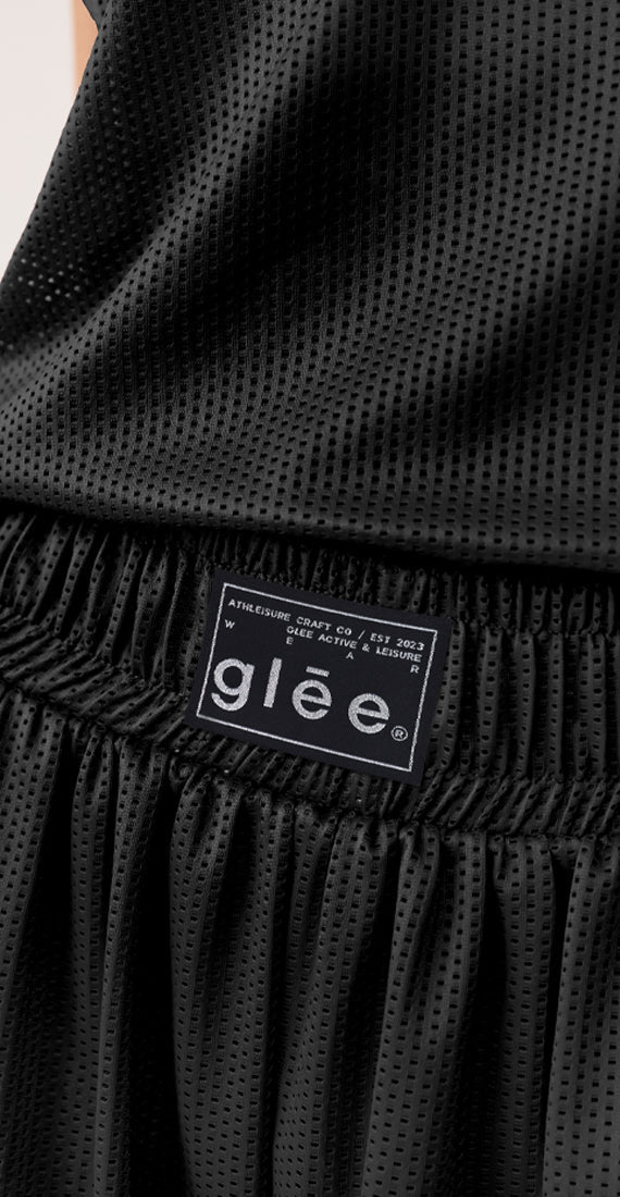 Close-up of the Glee x Be Fit Boxing Mesh Short in navy, highlighting the elastic waistband.