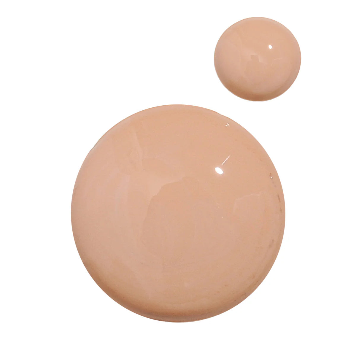 Two close up drops of Alastin HydraTint Pro Mineral SPF 36 sunscreen for ultimate protection and glow.