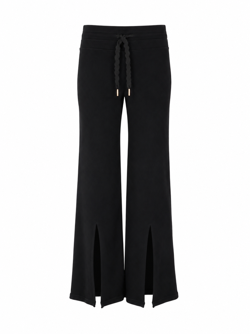 Front view of the Be Fit x Glee Legging Flare Soft Motion in black onyx with a drawstring waistband, wide legs and front hem slits.