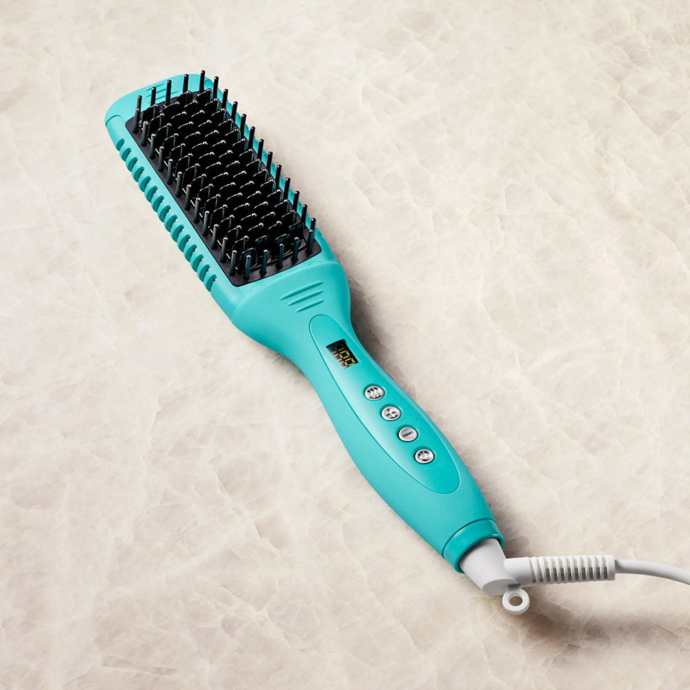 Turquoise Moroccanoil Heated Brush for smoothing and styling hair with digital temperature display and adjustable heat settings.