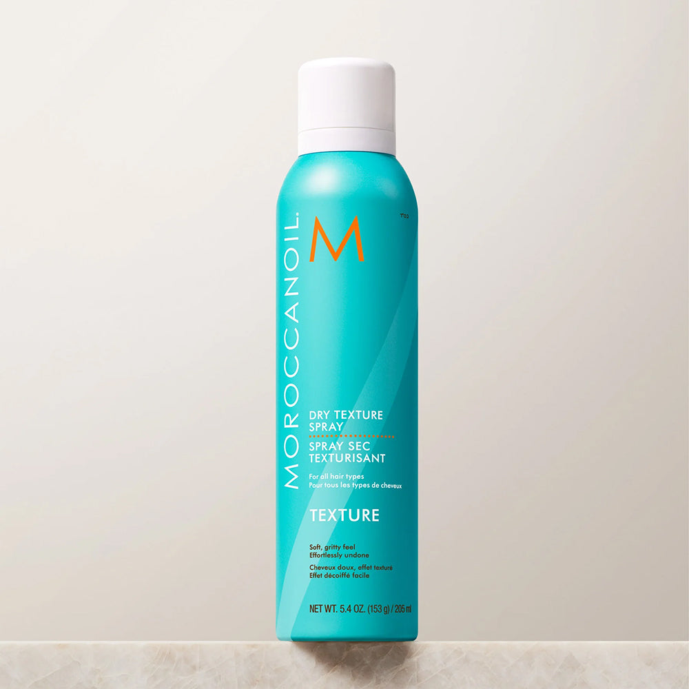 Turquoise can of Moroccanoil Dry Texture Spray for all hair types, 5.4 oz.