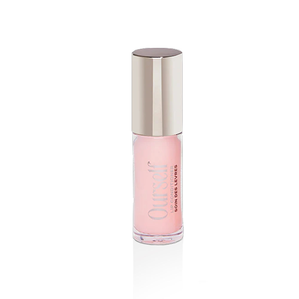 A tube of Ourself Lip Conditioner in the shade Clear.
