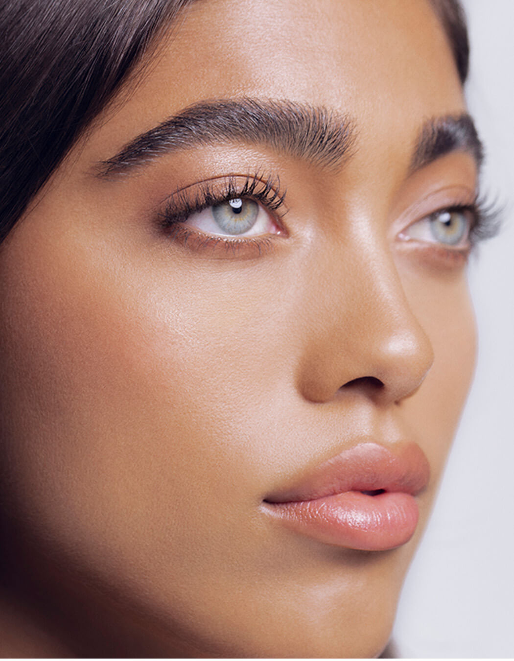 Close up of model after using RevitaLash RevitaBrow Advanced eyebrow conditioning serum.