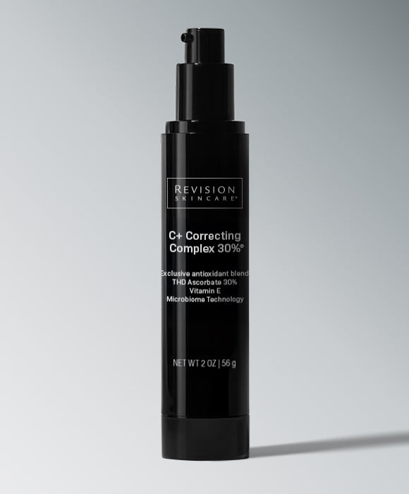 A black bottle of Revision Skincare C+ Correcting Complex 30%, exclusive antioxidant blend with THD ascorbate 30%, vitamin E, and microbiome technology, 2 fl oz.