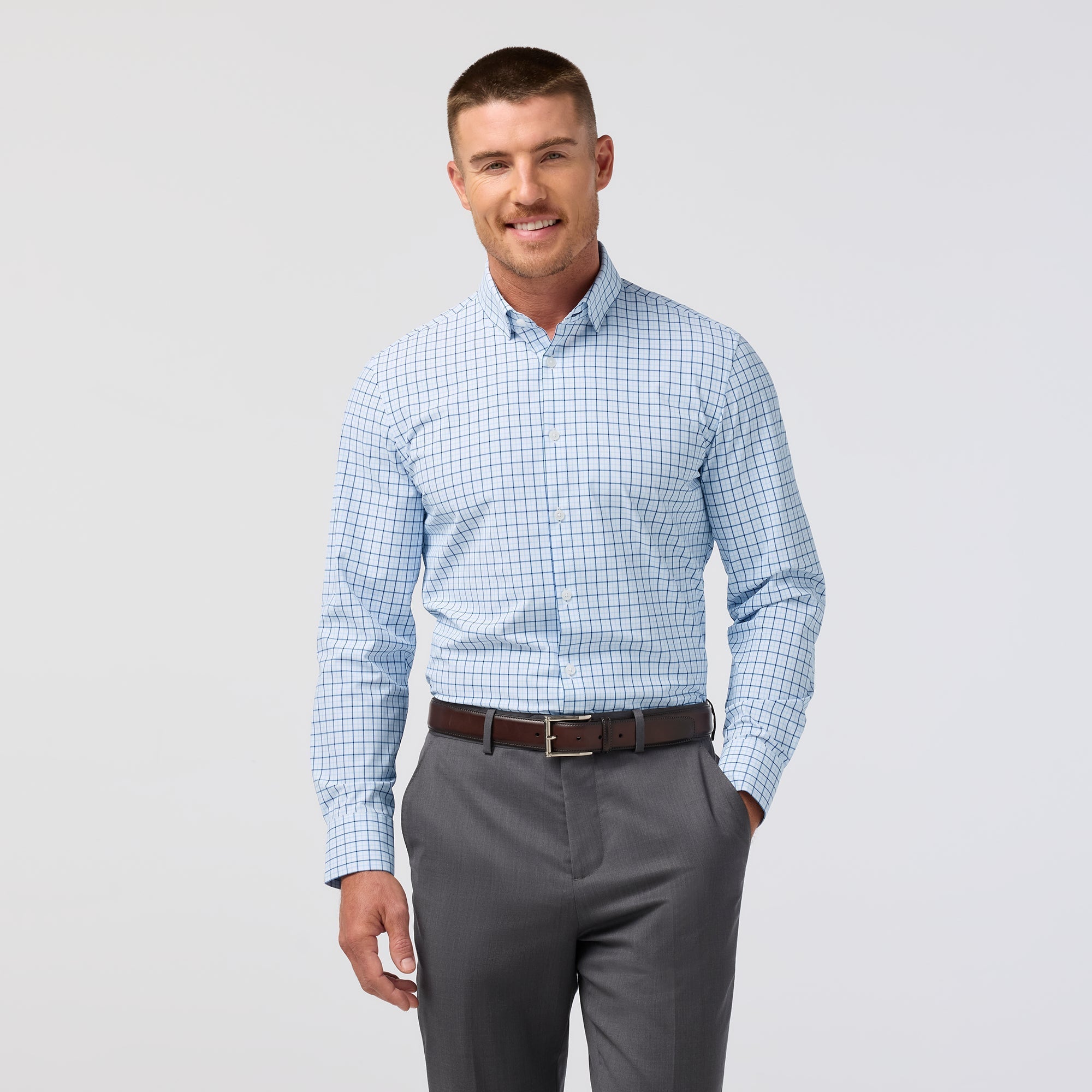 Front view of the Mizzen+Main Leeward Long Sleeve Dress Shirt (Trim Fit) in Cloud Blue Wyatt Plaid (light blue and white plaid), highlighting the plaid pattern and spread collar.