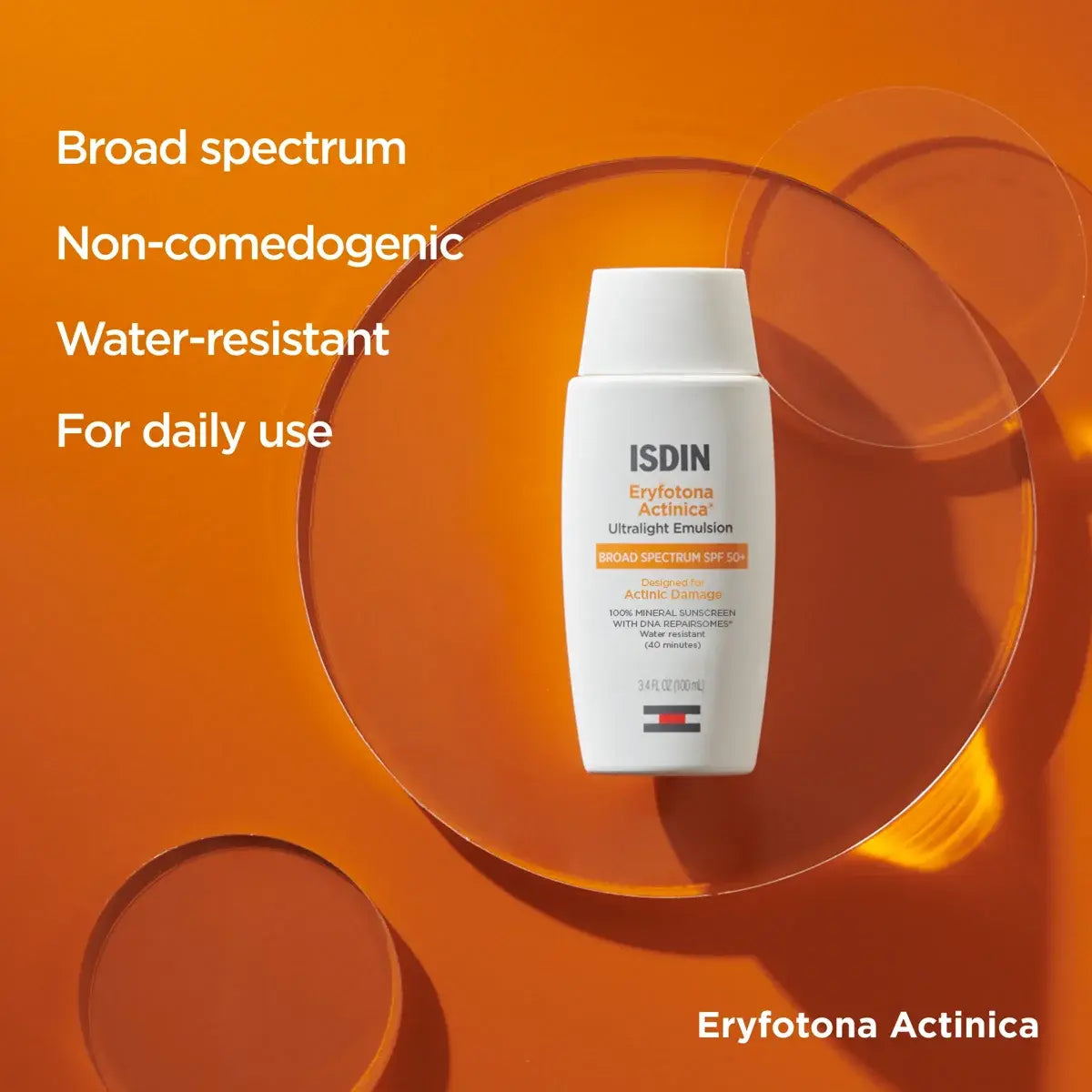 Bottle of broad spectrum, non-comedogenic, water-resistant ISDIN Eryfotona Actinica SPF 50+ on an orange background for daily use.