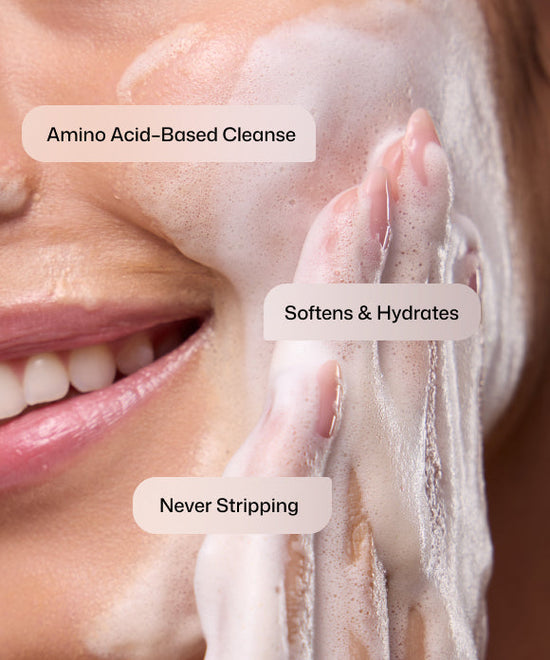 Close up of woman using Revision Skincare Gentle Foaming amino acid-based Cleanser without stripping to soften and hydrate skin.