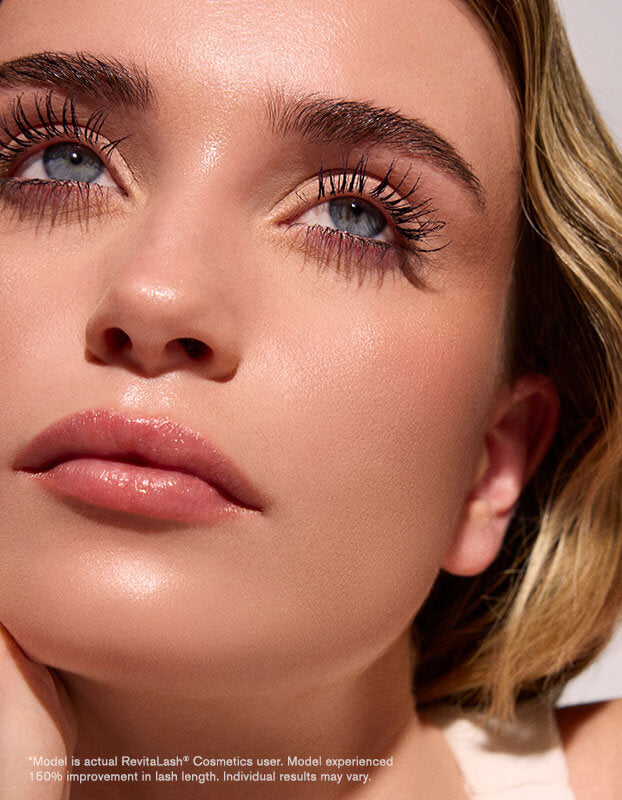 Close up of model wearing RevitaLash Length Define Tubing Mascara for 150% improvement in lash length.