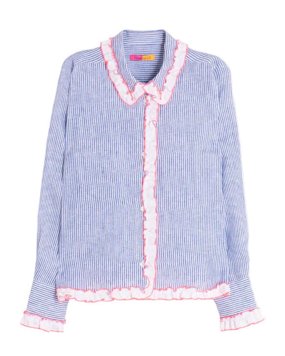 Vilagallo Pia Shirt in baby blue on a white background with white ruffle trim accented in pink.