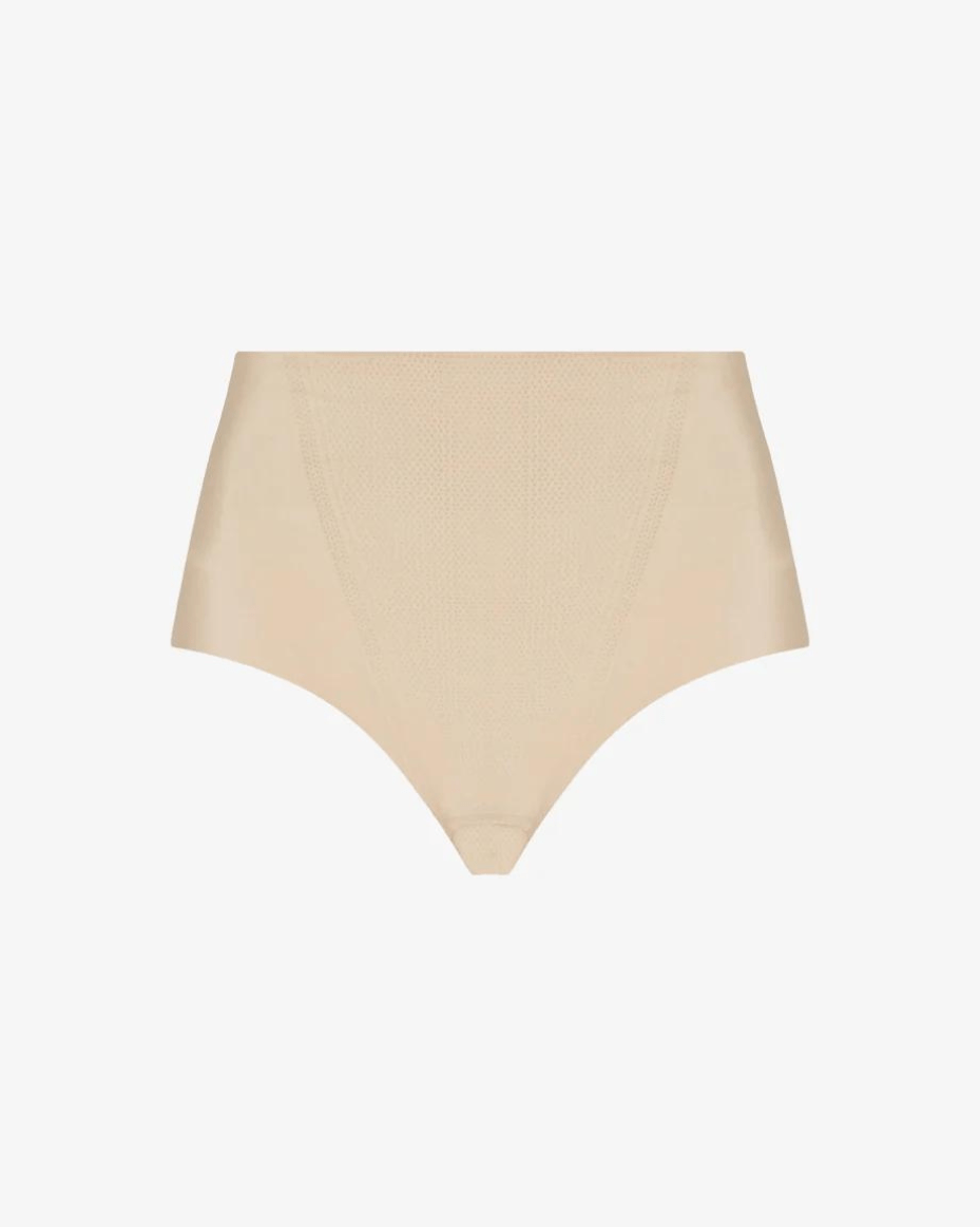 Commando Zone Smoothing Thong shapewear in a flat lay on a white background.