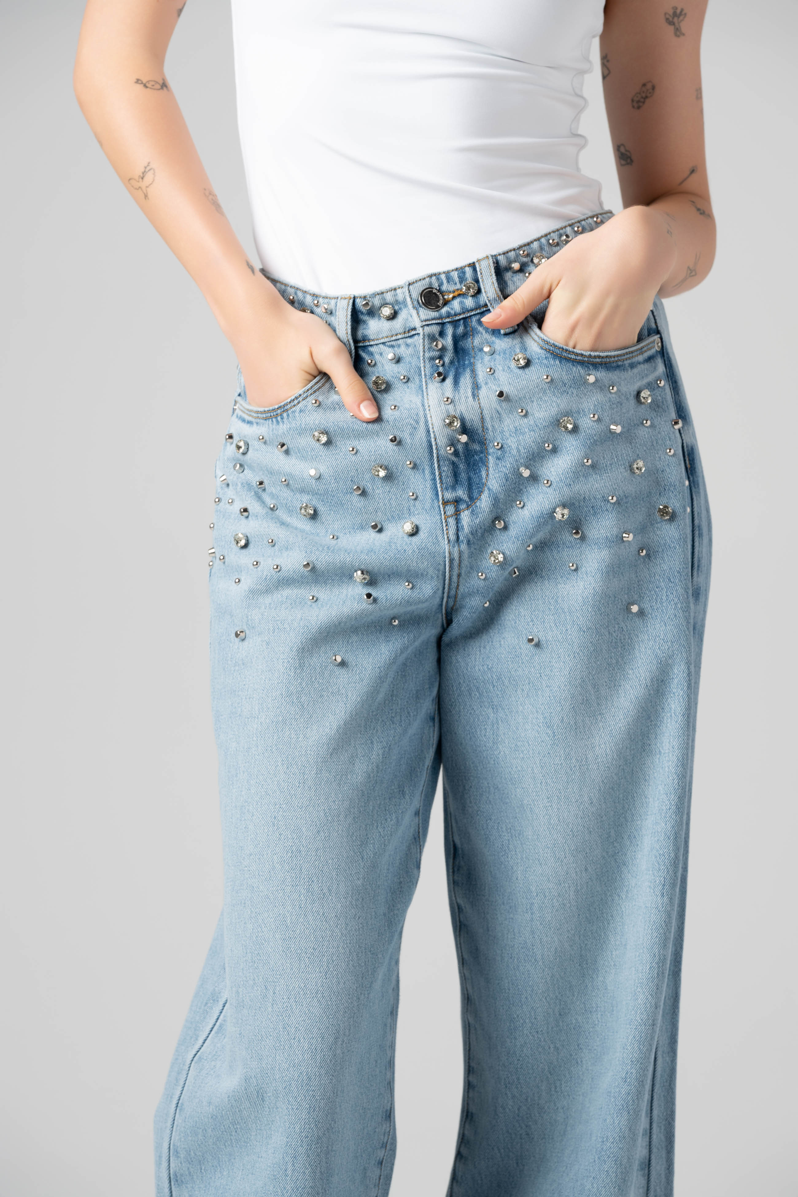 Close-up of the BLANKNYC Diamonds in the Sky Jean in Light Indigo, highlighting the rhinestone embellishments embedded throughout the denim.