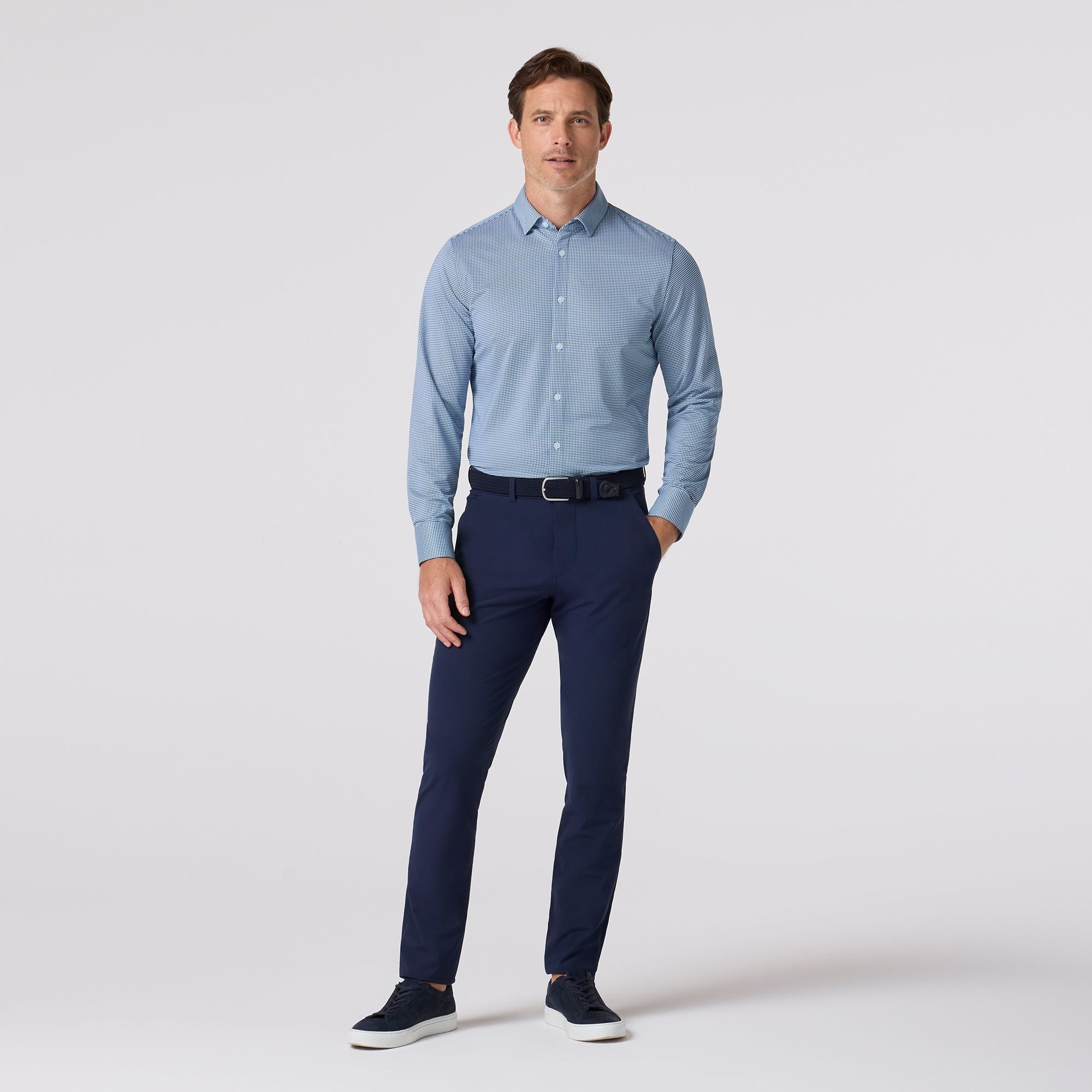 Model wearing the Mizzen+Main Long Sleeve Dress Shirt in Navy Peter Gingham, showing the fit and long sleeves.