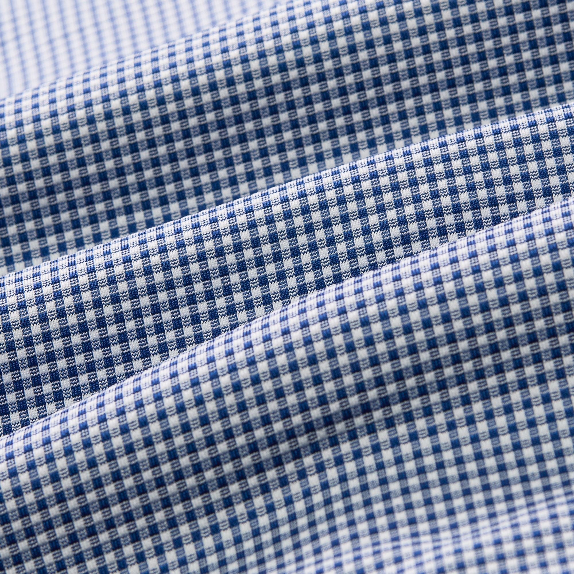 Fabric swatch of the Mizzen+Main Long Sleeve Dress Shirt in Navy Peter Gingham, showing the navy gingham pattern.