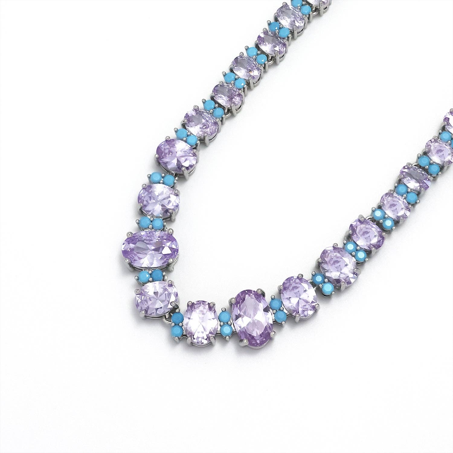 Simply Jewels silver-tone tennis necklace with alternating oval teal and purple cubic zirconia stones.