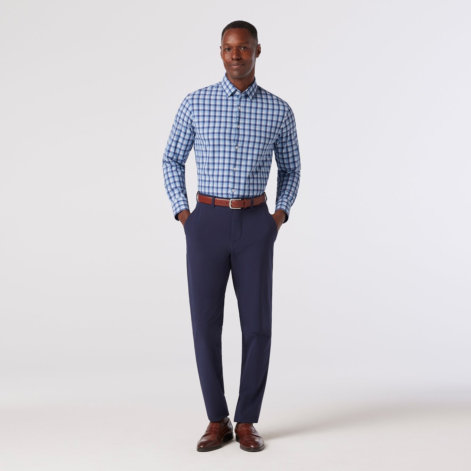 Model wearing Mizzen + Main Leeward LS Coastal Fjord Dylan Plaid dress shirt.
