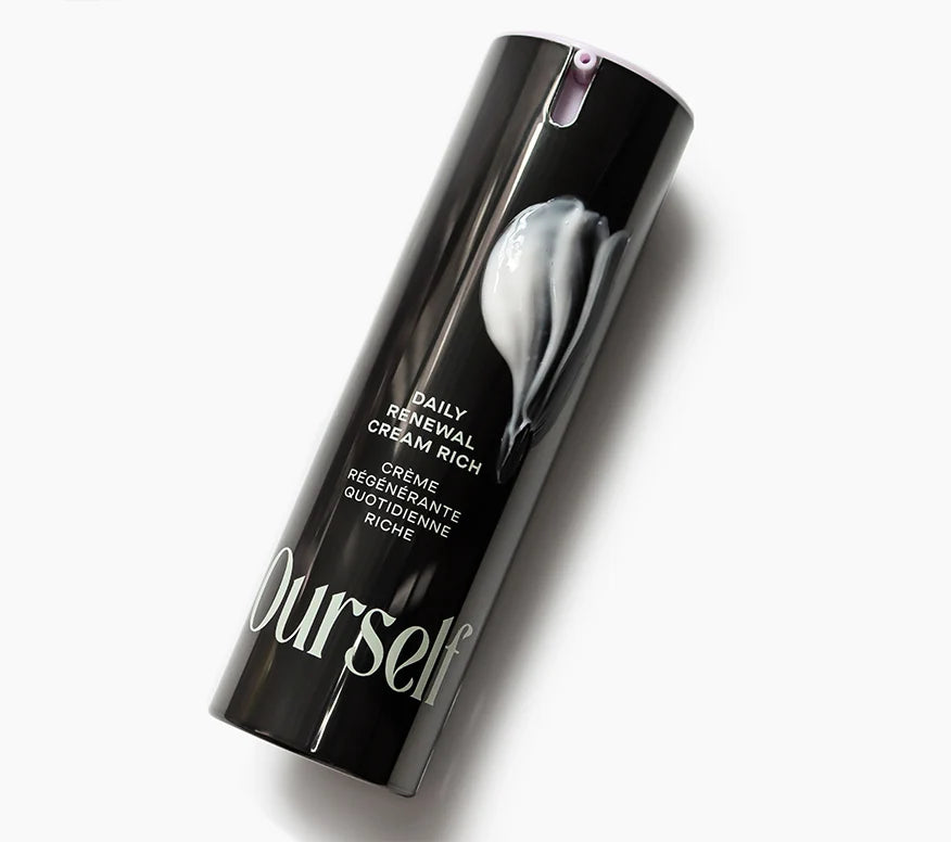 Bottle of Ourself Daily Renewal Cream Rich with Intides with swipe of cream on outside of bottle. 