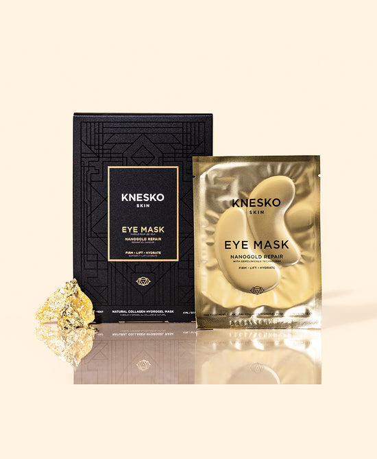 KNESKO Gold Repair Eye Mask single-treatment pouch displayed with black Nanogold Repair product box and decorative gold accent.