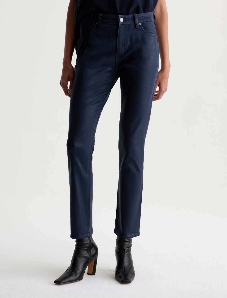 Front view of the AG Mari Coated Jean on a model, showing the mid-rise waist and straight legs.