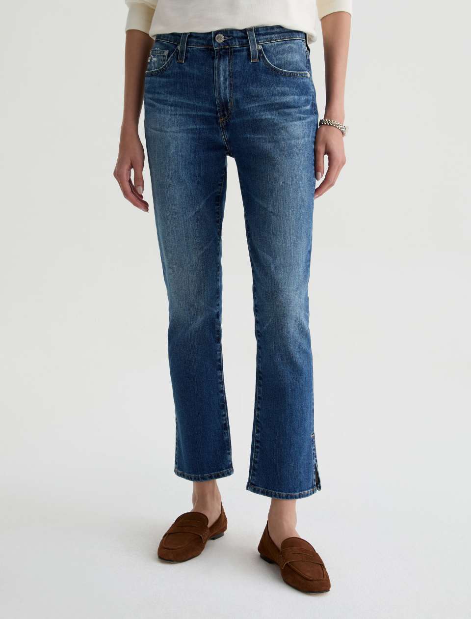Front view of model wearing Mari Crop Jean in 15 Years Prague by AG Jeans. 