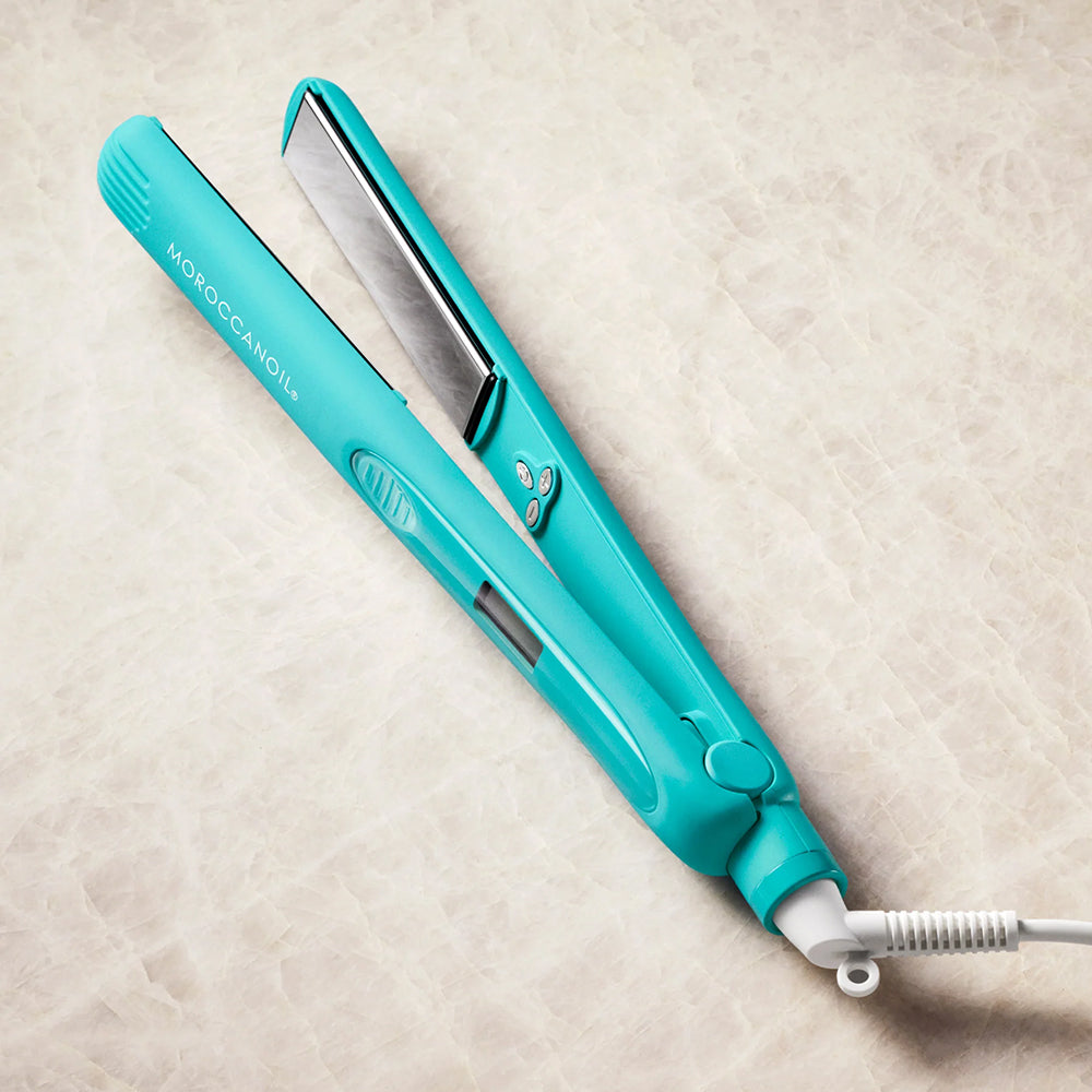Turquoise Moroccanoil Perfectly Polished Titanium Flat Iron for smoothing and straightening hair with digital temperature display and adjustable temperature controls.