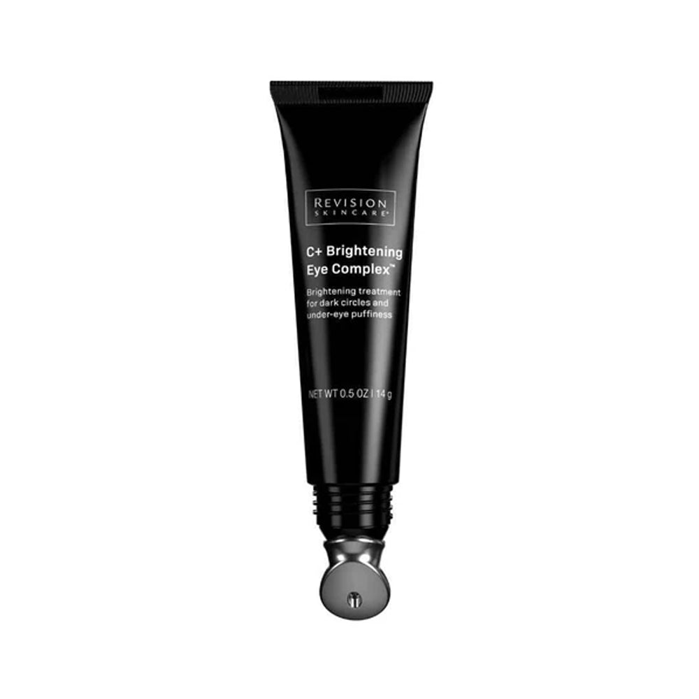 A black squeeze tube of Revision Skincare C+ Brightening Eye Complex treatment for dark circles and under-eye puffiness, 0.5 oz. 