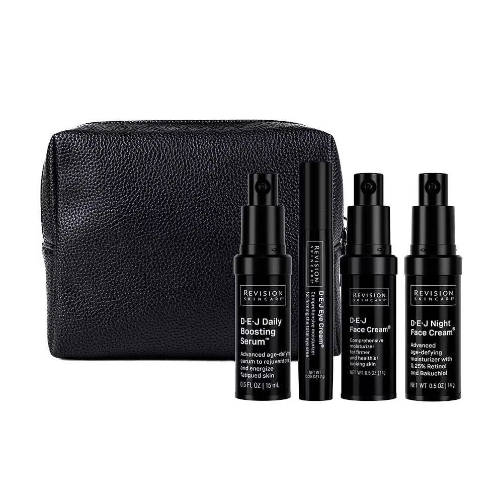Revision Skincare DEJ Skincare Regimen travel skincare set with black bottles of Daily Boosting Serum, Eye Cream, Face Cream, Night Face Cream, and a black cosmetic bag. 