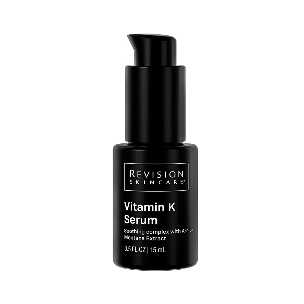 A black dispenser pump bottle of Revision Skincare Vitamin K Serum, soothing complex with Arnica Montana extract, 0.5 fl oz.