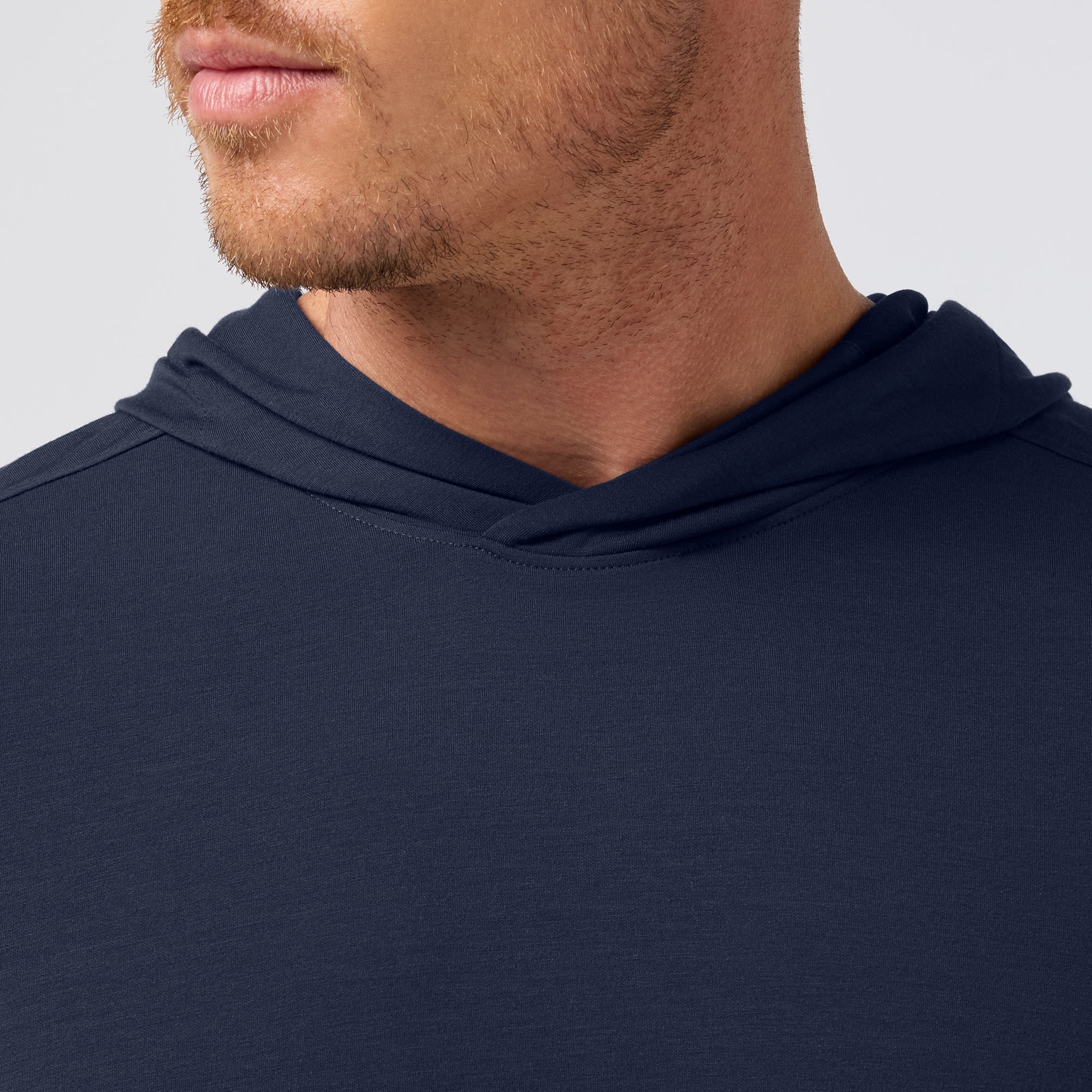Close-up of the hood and neckline on the Mizzen+Main Knox Hoodie in Navy.