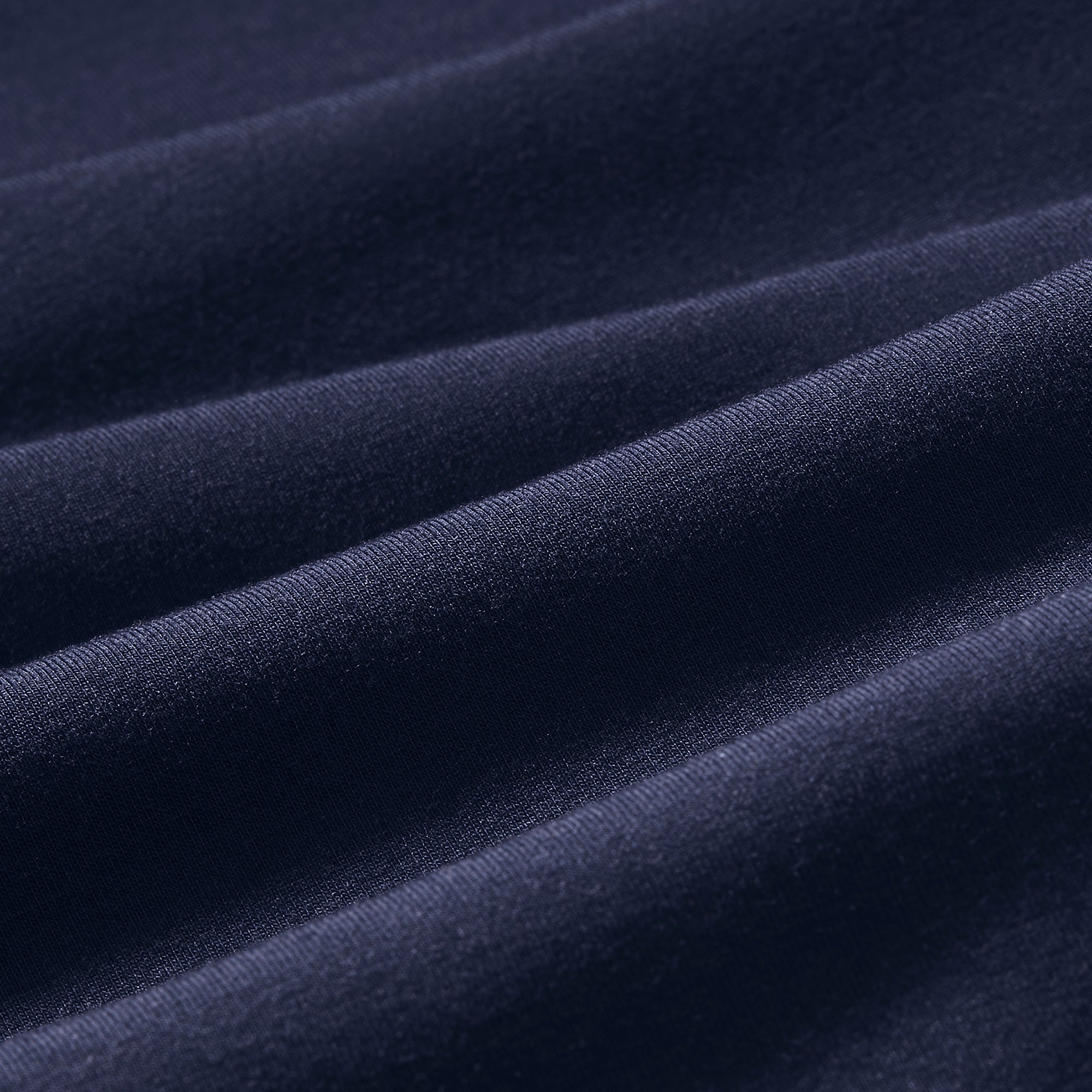 Fabric swatch of the Mizzen+Main Knox Hoodie in Navy, showing the TurboDry® four-way stretch performance fabric.