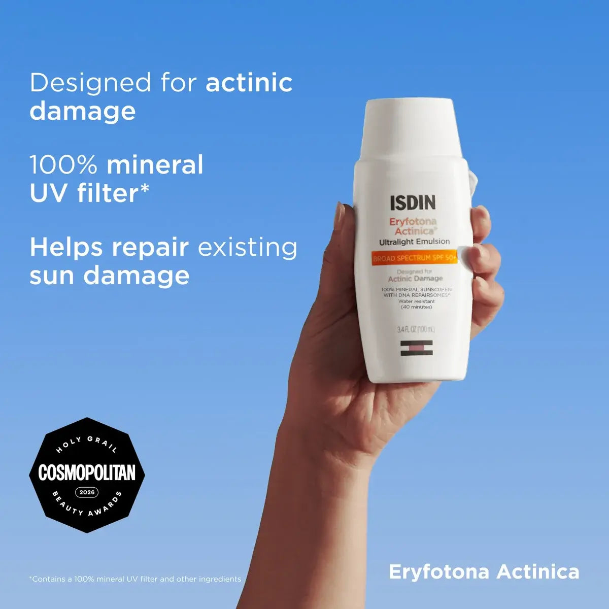 Hand holding bottle of ISDIN Eryfotona Actinica SPF 50+ designed for actinic damage with a 100% mineral UV filter to help repair existing sun damage. 
