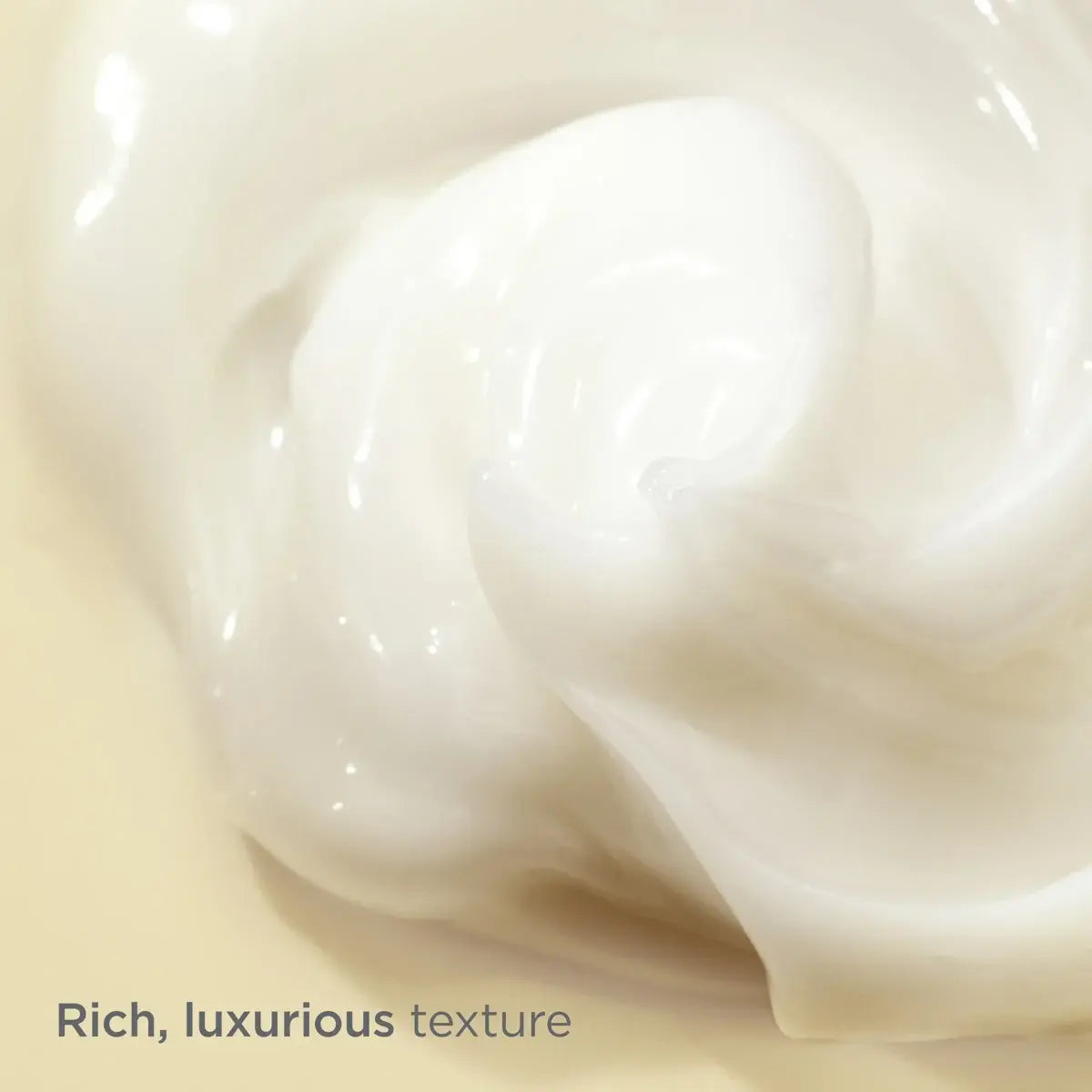 Close up swatch of the rich, luxurious texture of ISDINCEUTICS Age Contour expert firming and rejuvenating cream. 