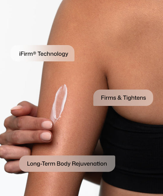 Close up of woman applying Revision Skincare BodiContour on her arm with iFirm Technology to firm and tighten for long-term body rejuvenation. 