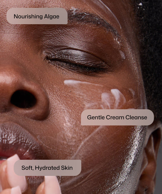 Close up of woman using Revision Skincare Gentle cream Cleansing Lotion with nourishing algae for soft, hydrated skin. 